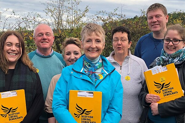 Alt texCouncillors Liz and Peter Barrett and the local Lib Dem Focus team gather before setting out to conduct one of their regular local resident's surveys