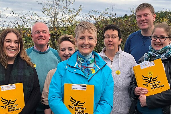 Alt texCouncillors Liz and Peter Barrett and the local Lib Dem Focus team gather before setting out to conduct one of their regular local resident's surveys